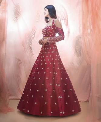 Cranberry lehenga with a corset style blouse 2