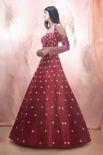 Cranberry lehenga with a corset style blouse
