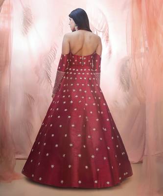 Cranberry lehenga with a corset style blouse 3
