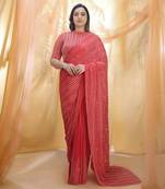 Hot red saree with elbow sleeve blouse