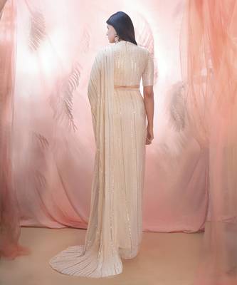 Golden saree with an elbow sleeve blouse 3