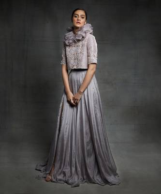 Featuring a dull lilac slit skirt with embroidered  jacket and ruffle neck 2