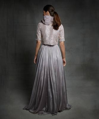 Featuring a dull lilac slit skirt with embroidered  jacket and ruffle neck 3