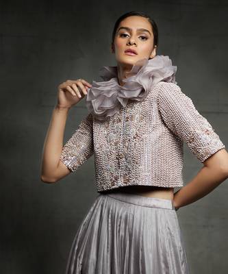 Featuring a dull lilac slit skirt with embroidered  jacket and ruffle neck 4