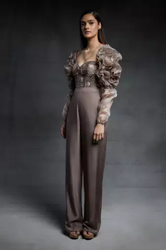 Featuring a chickoo embroidered corset jumpsuit with ruffle sleeves