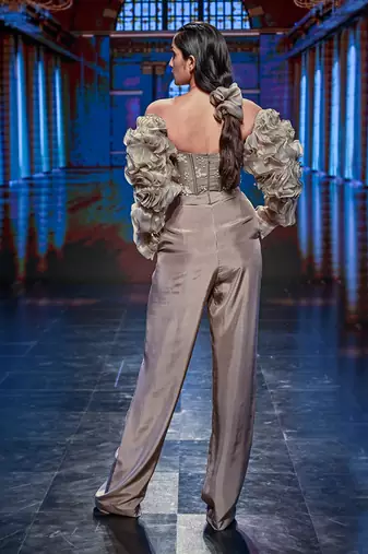 Featuring a chickoo embroidered corset jumpsuit with ruffle sleeves