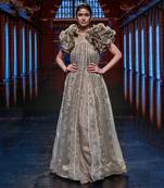 Featuring a chickoo embroidered trapeze gown with a ruffle jacket