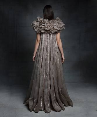 Featuring a chickoo embroidered trapeze gown with a ruffle jacket 3