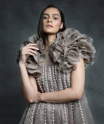 Featuring a chickoo embroidered trapeze gown with a ruffle jacket 4