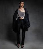 black embroidered jumpsuit with puff sleeves