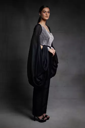 black embroidered jumpsuit with puff sleeves