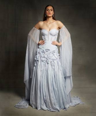 lilac blue embroidered ruffle gown with a floor length drape on both the sides 1