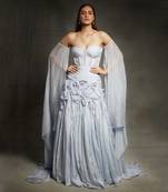 lilac blue embroidered ruffle gown with a floor length drape on both the sides