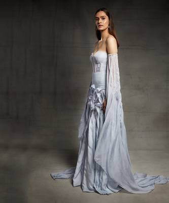 lilac blue embroidered ruffle gown with a floor length drape on both the sides 2