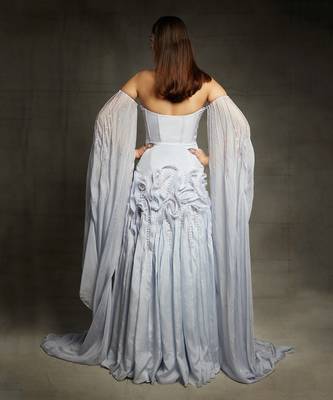 lilac blue embroidered ruffle gown with a floor length drape on both the sides 3