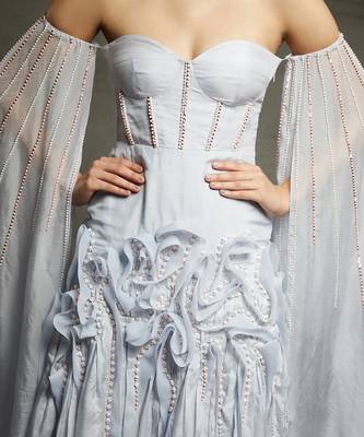 lilac blue embroidered ruffle gown with a floor length drape on both the sides 4