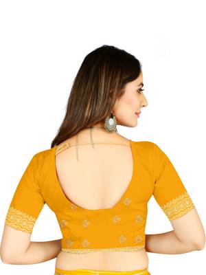 Mustard embroidered georgette saree with blouse 1