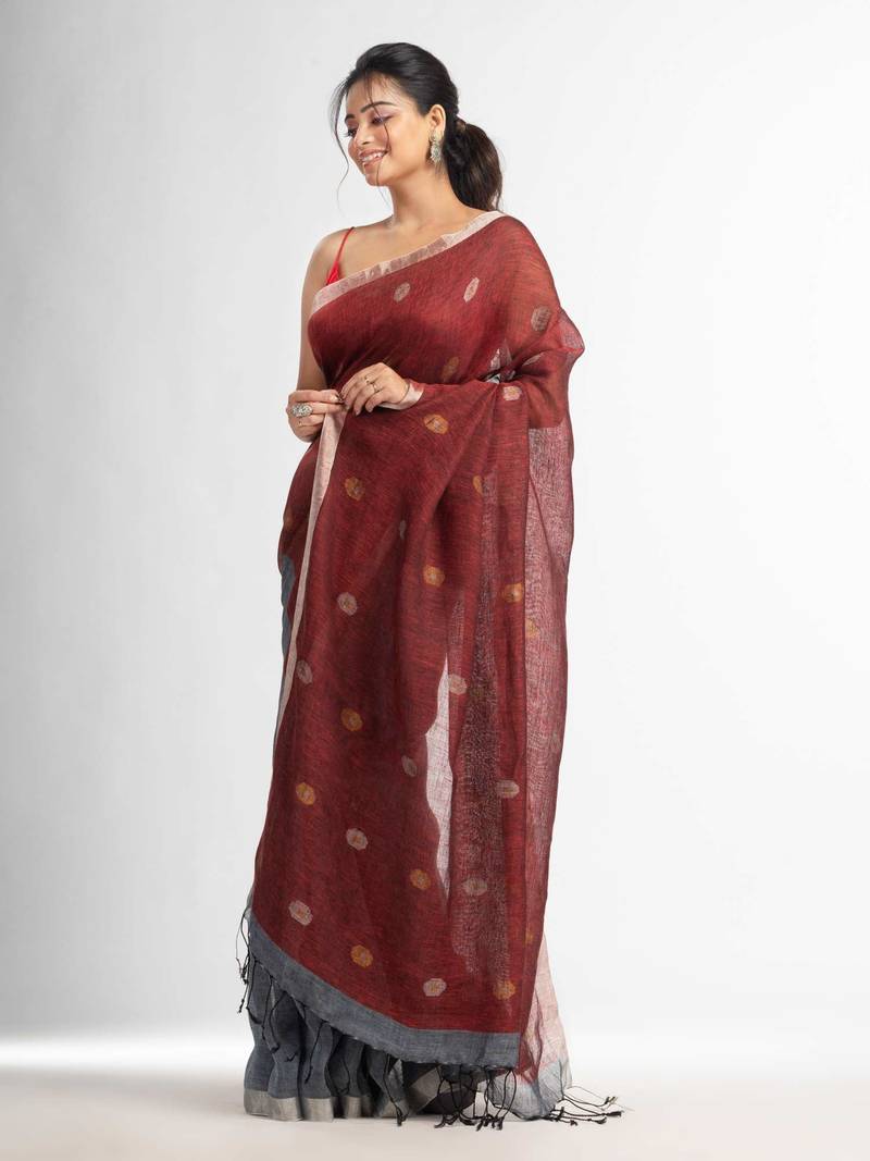 Grey rust half and half with ball buti pallu in silver zari border handwoven linen saree