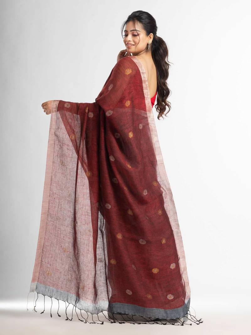 Grey rust half and half with ball buti pallu in silver zari border handwoven linen saree