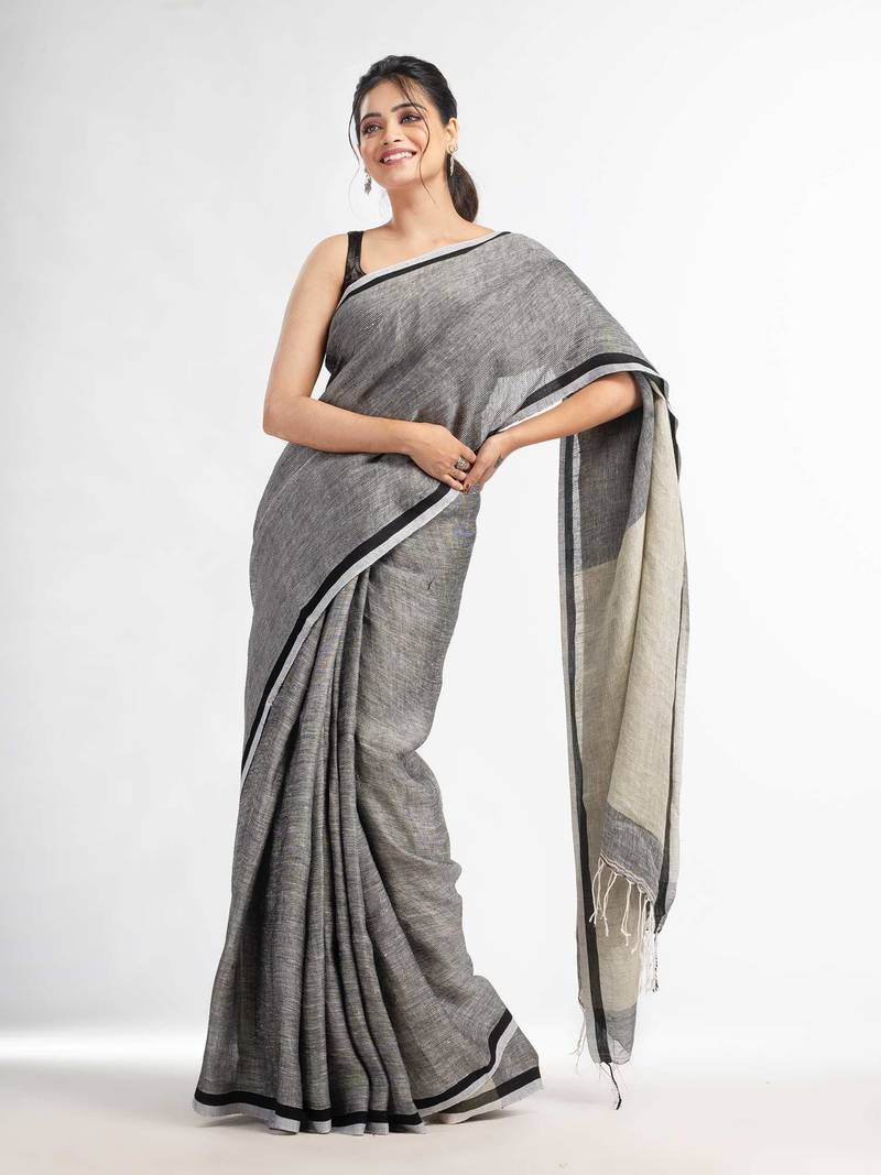 Grey twill weaving with sage green pallu in white and black border handwoven linen saree