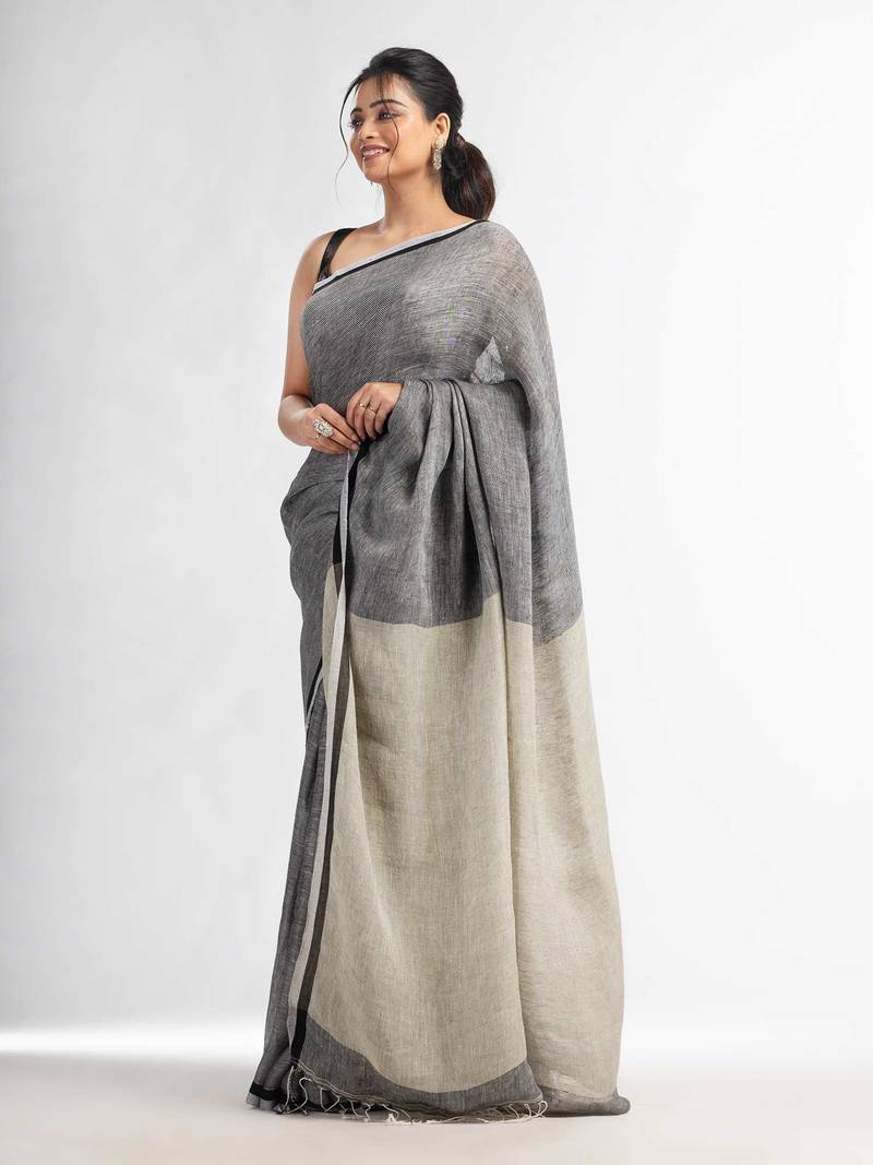 Grey twill weaving with sage green pallu in white and black border handwoven linen saree