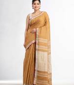 saffron with silver zari pallu in silver zari border handwoven linen saree