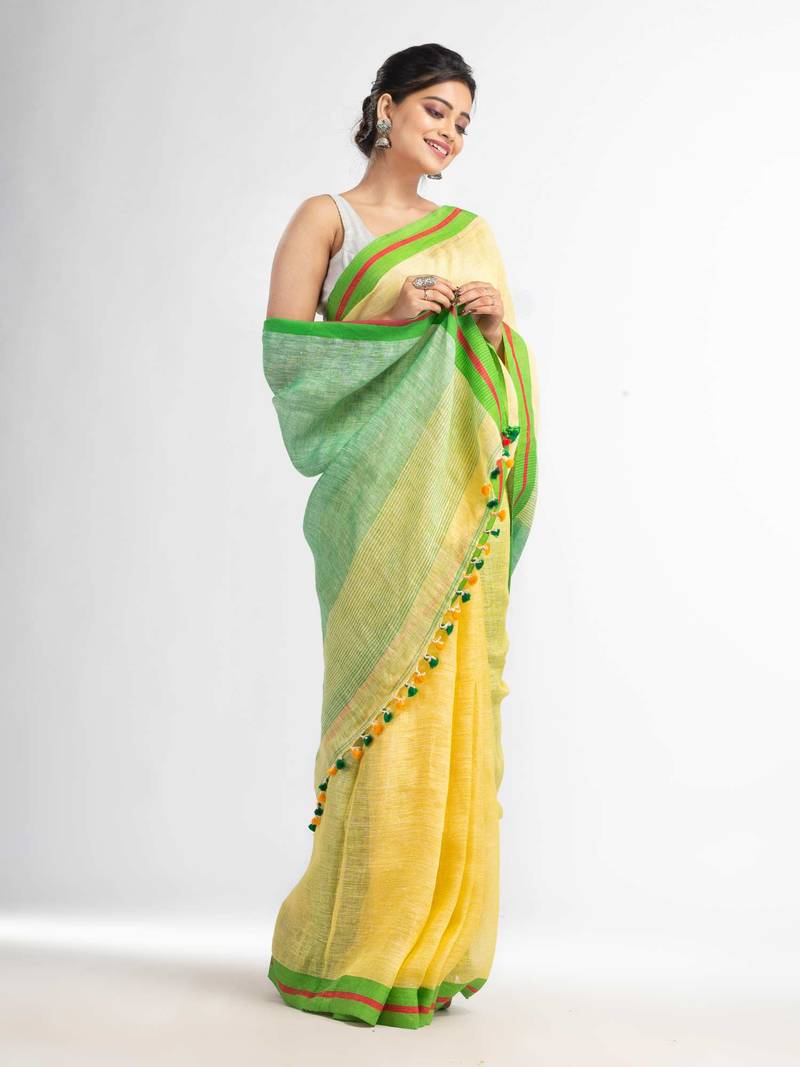 Yellow with green pallu in multi colour boeder handwoven linen saree