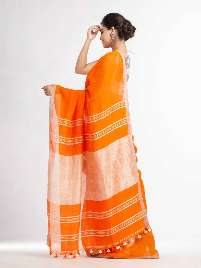 Orange with silver zari pallu in silver zari border handwoven linen saree