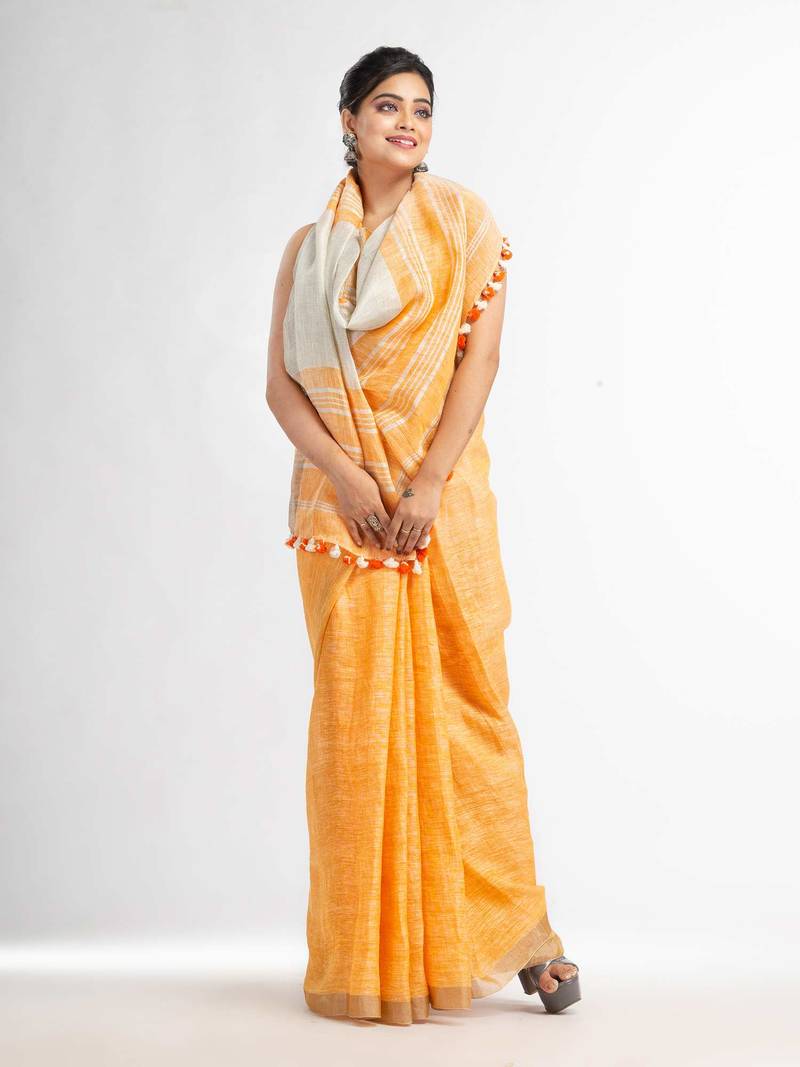 Orange with silver zari pallu in silver zari border handwoven linen saree