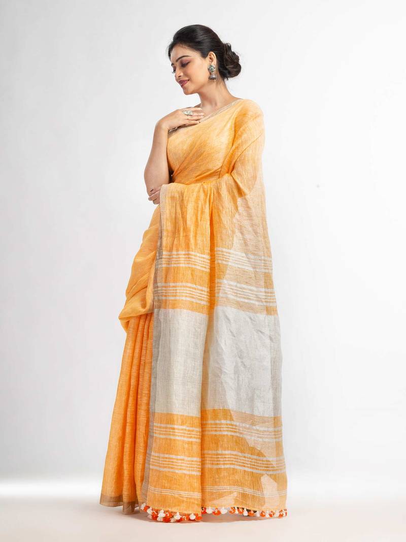 Orange with silver zari pallu in silver zari border handwoven linen saree