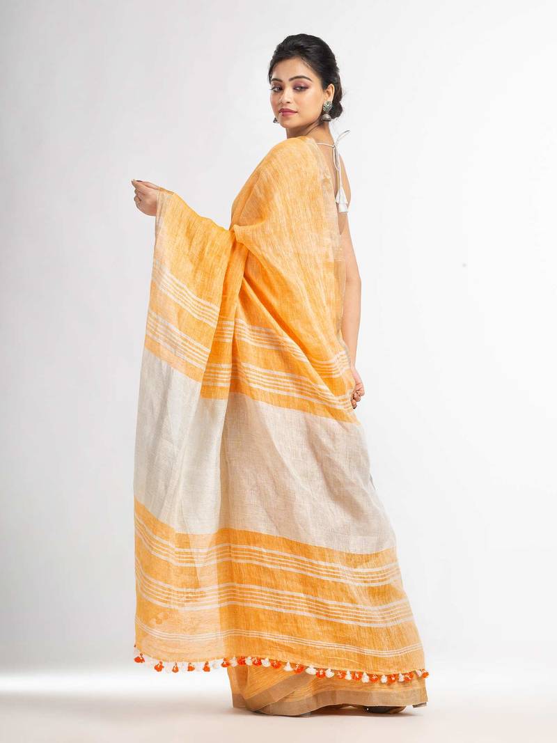 Orange with silver zari pallu in silver zari border handwoven linen saree