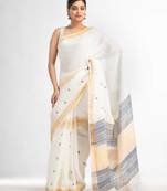 white half body buti with gold zari and nevy blue pallu in gold zari border handwoven linen saree