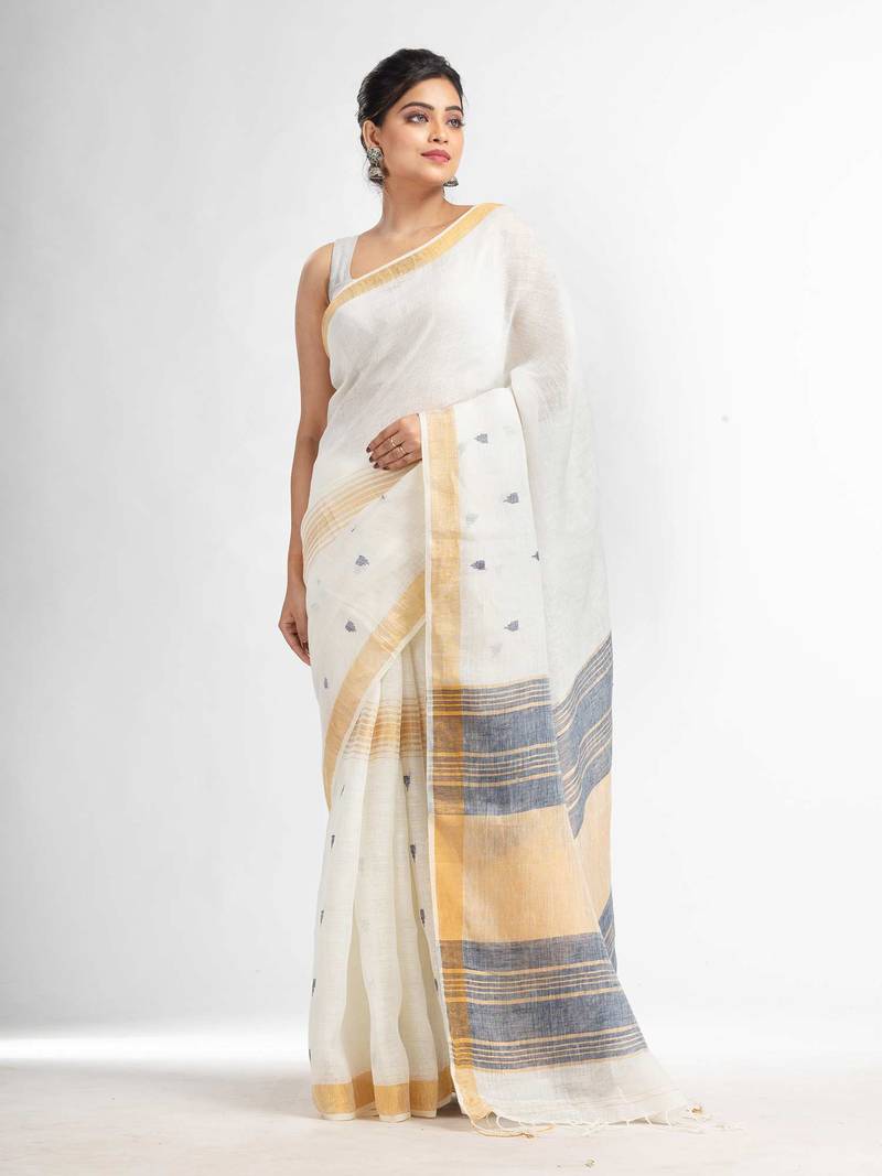 white half body buti with gold zari and nevy blue pallu in gold zari border handwoven linen saree