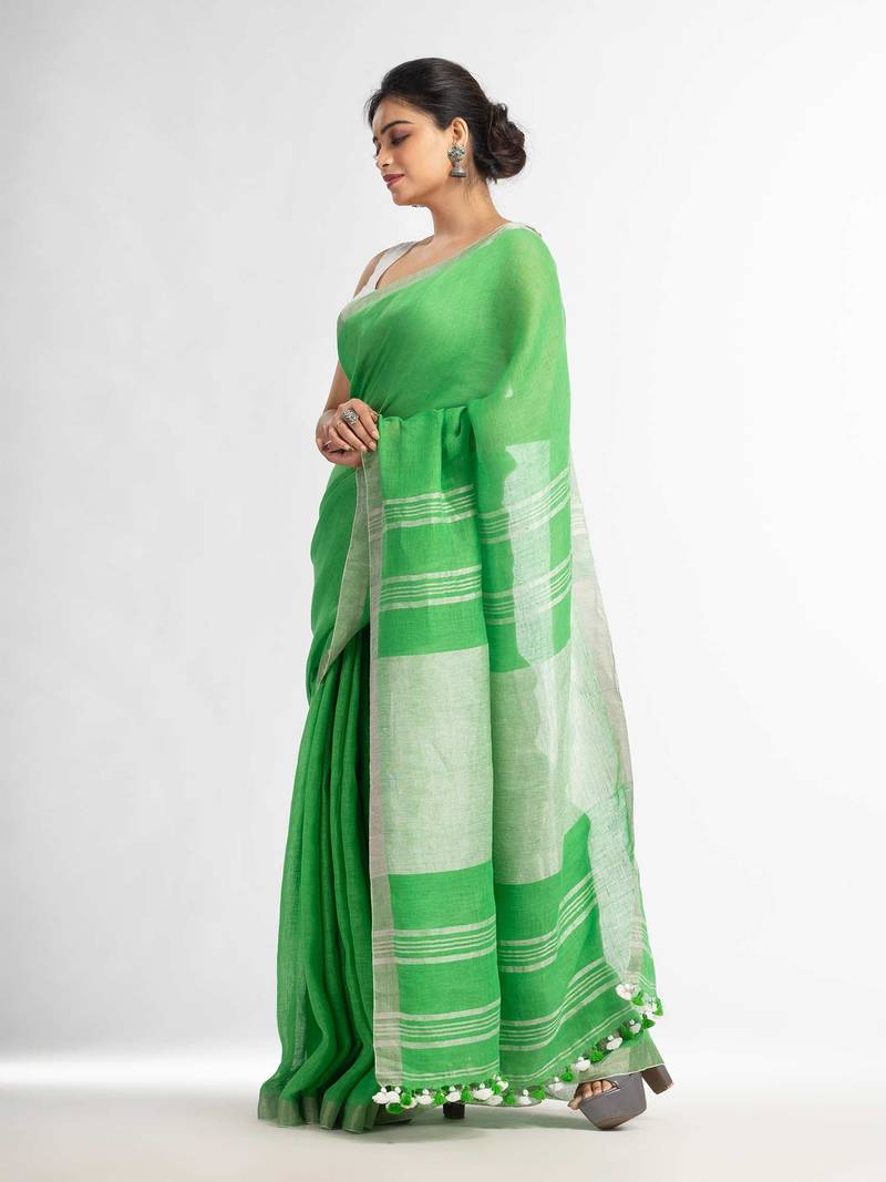 Green with silver zari pallu in silver zari border handwoven linen saree