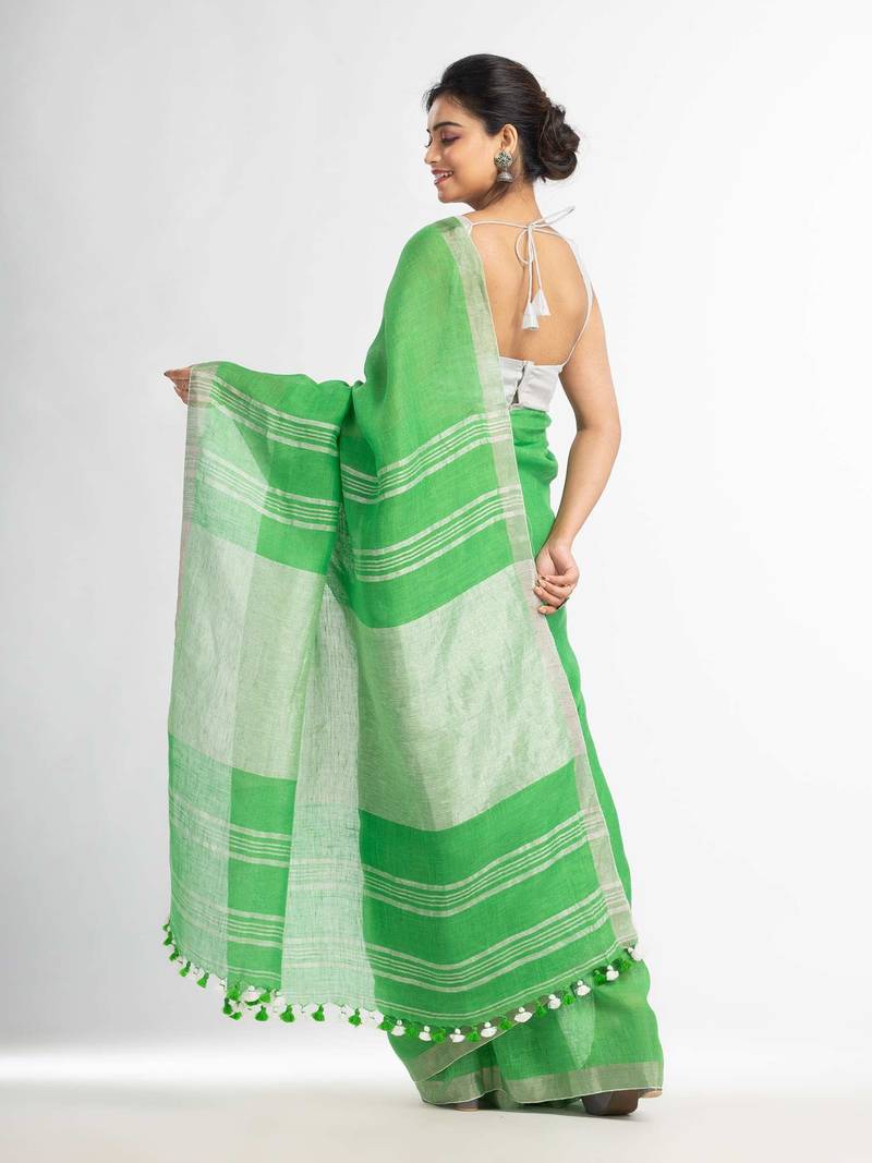 Green with silver zari pallu in silver zari border handwoven linen saree