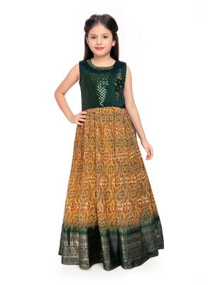 Betty Green coloured Gown will make your little one look beautiful. 1