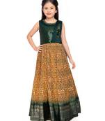 Betty Green coloured Gown will make your little one look beautiful.