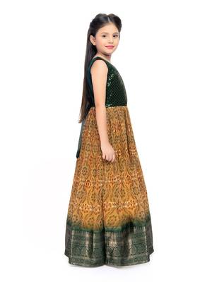 Betty Green coloured Gown will make your little one look beautiful. 4