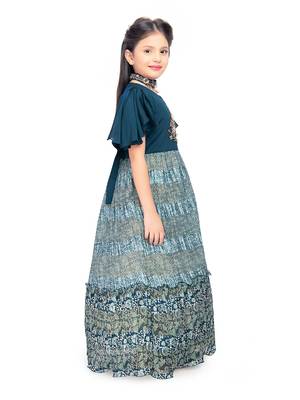 Betty Blue coloured Gown will make your little one look beautiful. 3