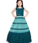 Betty M.Blue coloured Gown will make your little one look beautiful.
