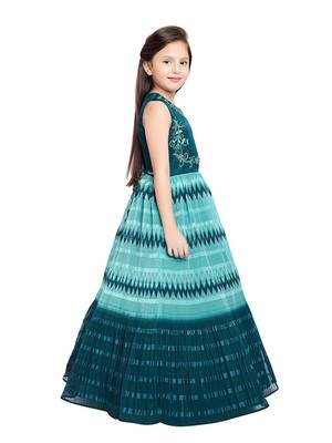 Betty M.Blue coloured Gown will make your little one look beautiful. 4
