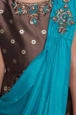 Betty R.Green coloured Gown will make your little one look beautiful. 5
