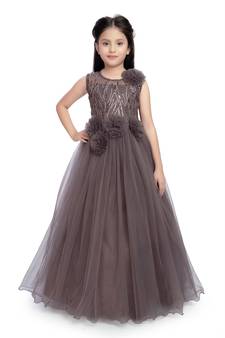 Betty Grapes coloured Gown will make your little one look beautiful.