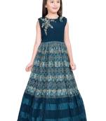 Betty P.Blue coloured Gown will make your little one look beautiful.