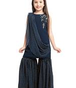 Your little princess will certainly steal the limelight at the next wedding party Gharara Set from Betty