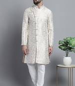 Men designer White sherwani with golden print with Churidar Pajamam by treemoda