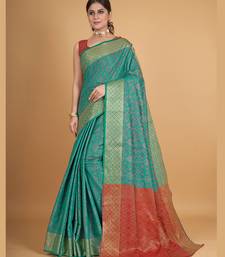 Green Woven Design Silk Blend Saree With Unstitched Blouse Piece