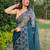 Teal embroidered organza saree with blouse
