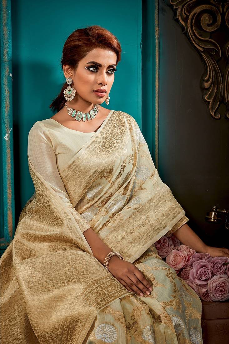 Off White Linen Silk Saree With Zari Weaving Work