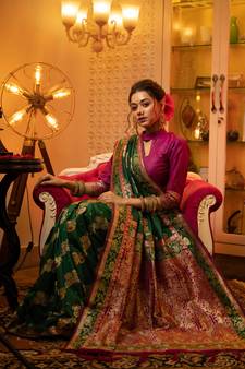 Green woven banarasi silk saree with blouse